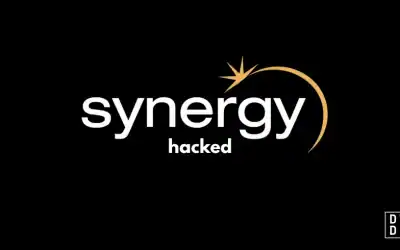 The Synergy logo — lowercase white wordmark with an orange crescent and starburst — on a black background, with the word 'hacked' beneath it.