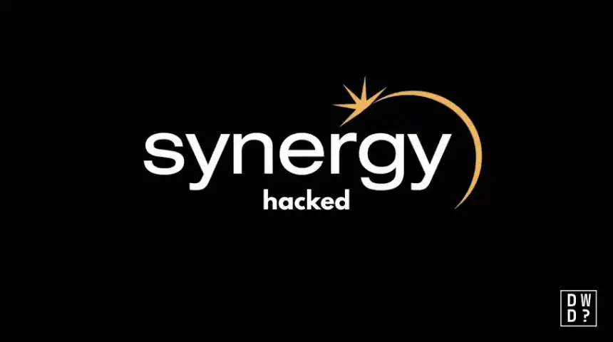 The Synergy logo — lowercase white wordmark with an orange crescent and starburst — on a black background, with the word 'hacked' beneath it.